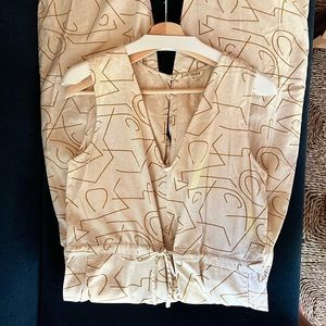 Ali Golden drawstring jumpsuit